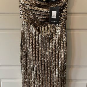 Gold and black sequin dress